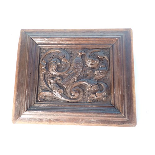 83 - A set of five 17th Century Dutch carved oak Panels depicting hawks within leafage surround