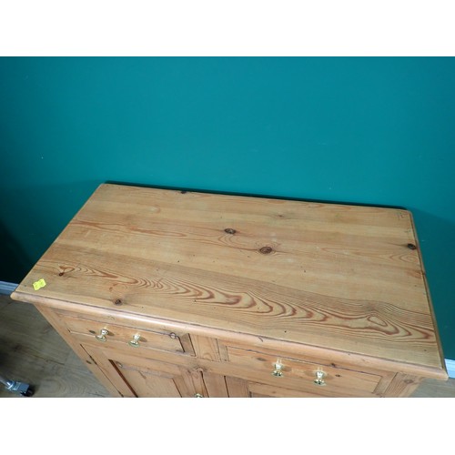 694 - A pine Cupboard fitted two frieze drawers above two cupboard doors 3ft W x 2ft 10in H and two Wall M... 