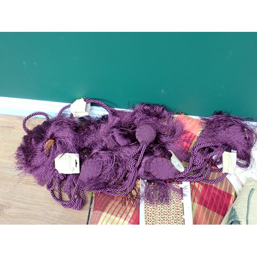 735 - A box of Table Cloths, Curtain Ties and Fabric