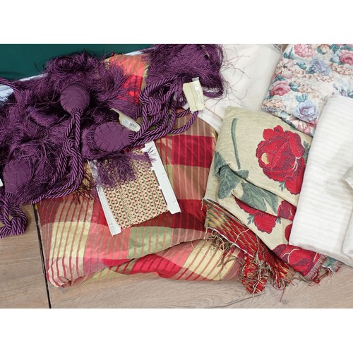 735 - A box of Table Cloths, Curtain Ties and Fabric