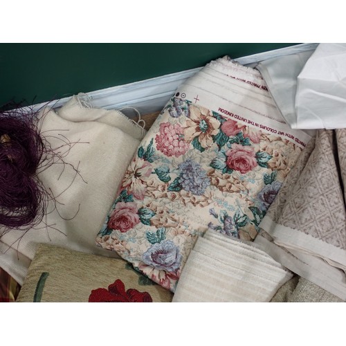 735 - A box of Table Cloths, Curtain Ties and Fabric