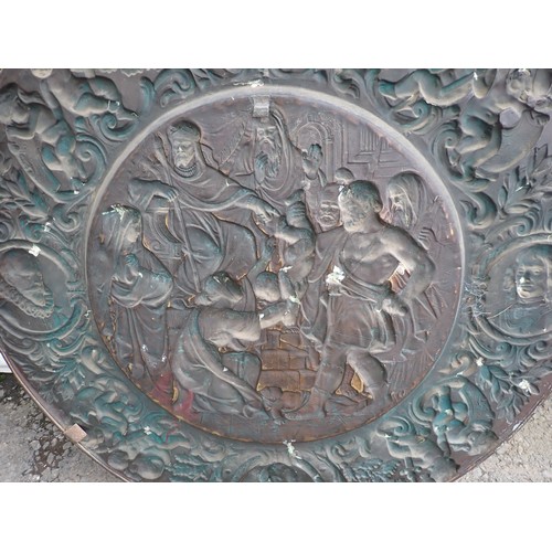 520 - A large embossed copper Plaque depicting the massacre of the innocents, 3ft 2in Diam.