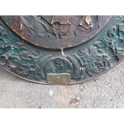 520 - A large embossed copper Plaque depicting the massacre of the innocents, 3ft 2in Diam.