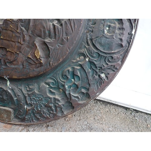 520 - A large embossed copper Plaque depicting the massacre of the innocents, 3ft 2in Diam.