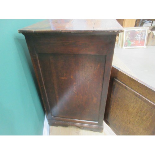 643 - An 18th Century oak and mahogany crossbanded enclosed Dresser Base fitted three frieze drawers above... 