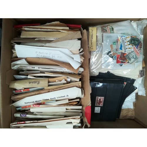 215 - A box containing a  Stamp Album, various loose Stamps etc and a box of unused Stamp Albums