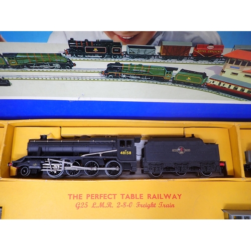 1002 - A boxed Hornby-Dublo G25 3-rail Freight Set. All items are in mint condition showing only slight use... 