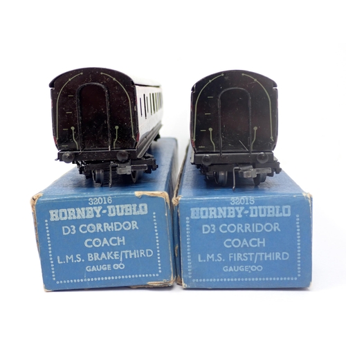 1014 - Two Hornby-Dublo D3 LMS Corridor Coaches, near mint with 4/51 boxes. LMS 1/3rd and brake/3rd, both w... 