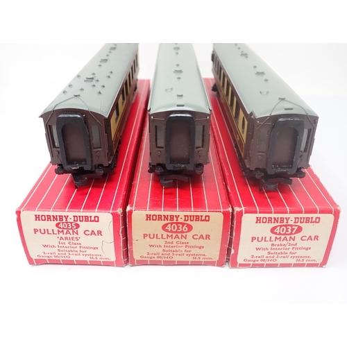 1023 - A rake of three boxed Hornby-Dublo Pullman Coaches. Coaches comprising 4035, 4036, 4037, all with th... 