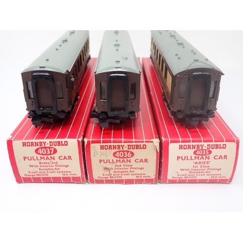 1023 - A rake of three boxed Hornby-Dublo Pullman Coaches. Coaches comprising 4035, 4036, 4037, all with th... 