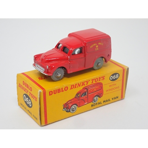 1025 - A boxed Dublo Dinky Toys No.068 Royal Mail Van, mint. Model in mint condition with grey plastic whee... 