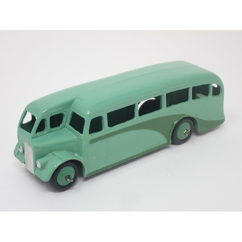 1026 - A Dinky Toys No.29E green single decker Bus, mint. Model in green with green hubs in mint condition.... 