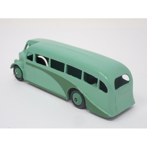 1026 - A Dinky Toys No.29E green single decker Bus, mint. Model in green with green hubs in mint condition.... 