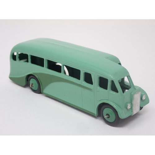 1026 - A Dinky Toys No.29E green single decker Bus, mint. Model in green with green hubs in mint condition.... 