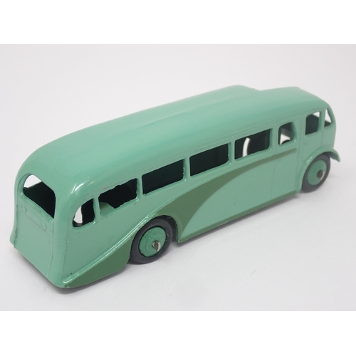 1026 - A Dinky Toys No.29E green single decker Bus, mint. Model in green with green hubs in mint condition.... 