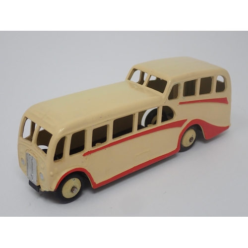 1027 - A Dinky Toys No.29F cream Observation Coach, mint condition. Model in cream with cream hubs in mint ... 