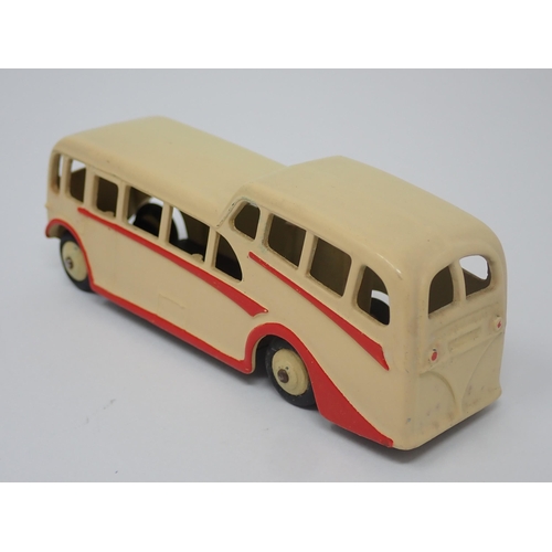 1027 - A Dinky Toys No.29F cream Observation Coach, mint condition. Model in cream with cream hubs in mint ... 