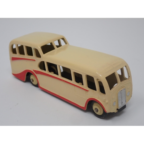 1027 - A Dinky Toys No.29F cream Observation Coach, mint condition. Model in cream with cream hubs in mint ... 