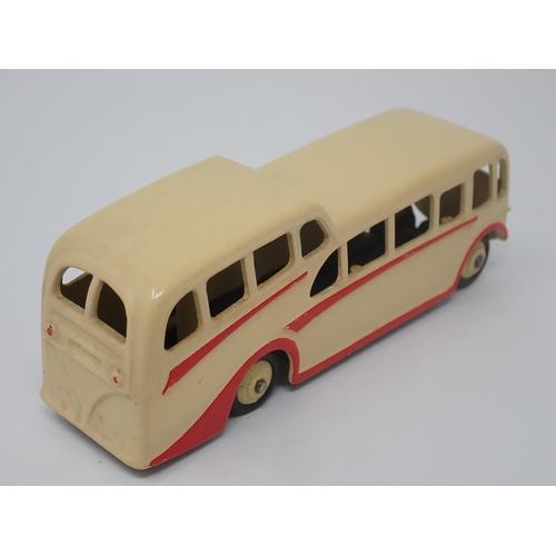 1027 - A Dinky Toys No.29F cream Observation Coach, mint condition. Model in cream with cream hubs in mint ... 