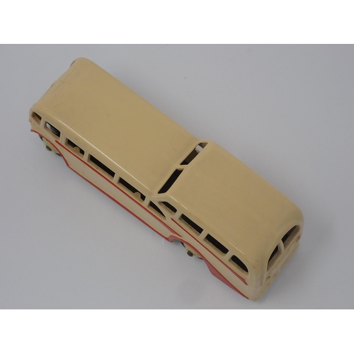 1027 - A Dinky Toys No.29F cream Observation Coach, mint condition. Model in cream with cream hubs in mint ... 