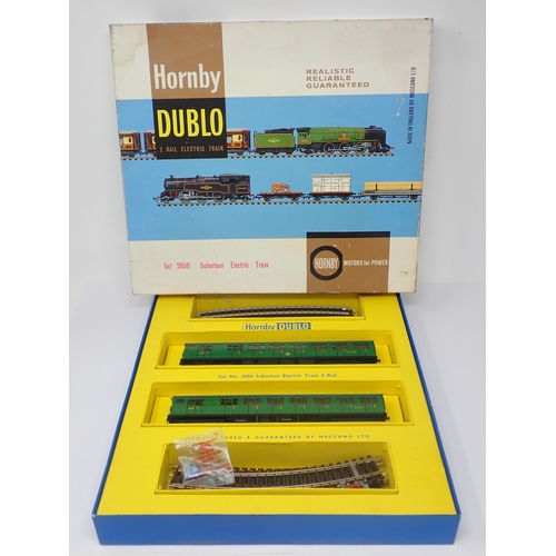 1037 - A boxed Hornby-Dublo N0.2050 Suburban Electric Train Set. Power Car and Trailer Car are unused, orig... 