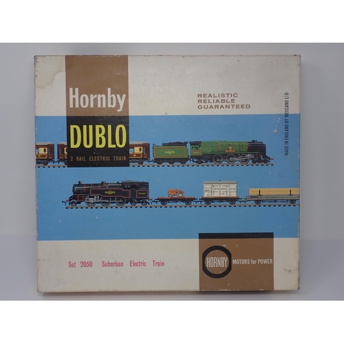 1037 - A boxed Hornby-Dublo N0.2050 Suburban Electric Train Set. Power Car and Trailer Car are unused, orig... 