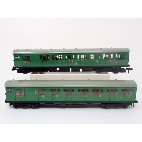 1037 - A boxed Hornby-Dublo N0.2050 Suburban Electric Train Set. Power Car and Trailer Car are unused, orig... 