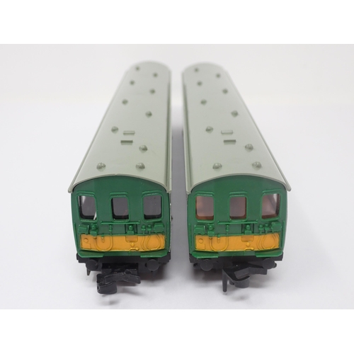 1037 - A boxed Hornby-Dublo N0.2050 Suburban Electric Train Set. Power Car and Trailer Car are unused, orig... 