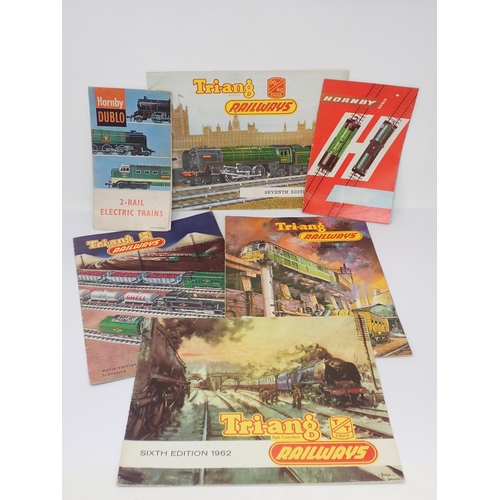 1048 - Twelve 2 and 3-rail Catalogues including Hornby-Dublo and Tri-ang/Hornby amalgamation catalogues tog... 