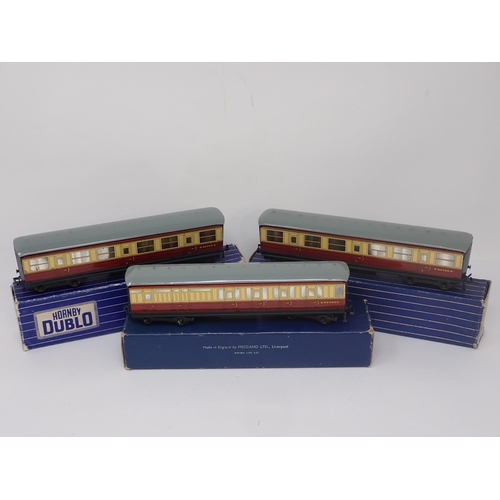 1050 - Three boxed Hornby-Dublo D11 Corridor Coaches. Coaches comprise 2x 1/3rd and 1x Brake/3rd. All excel... 