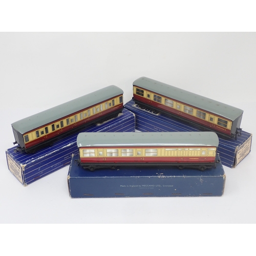 1050 - Three boxed Hornby-Dublo D11 Corridor Coaches. Coaches comprise 2x 1/3rd and 1x Brake/3rd. All excel... 