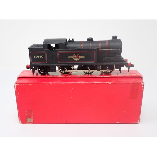 1059 - A boxed Hornby-Dublo No.2217 0-6-2T Locomotive. Tank is in mint condition. Tape mark to one side. Co... 