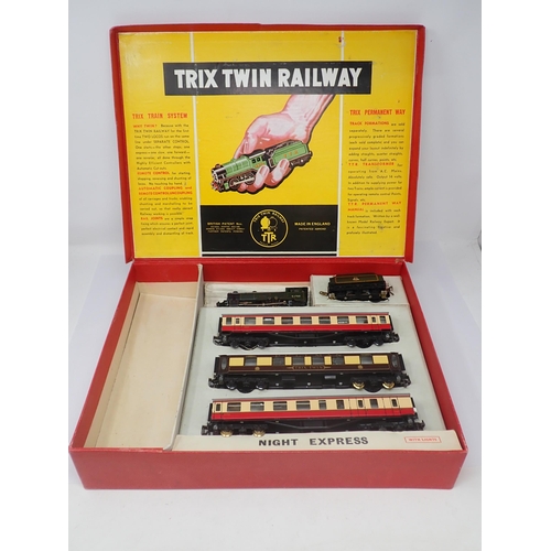 1062 - A boxed Trix Twin Pychley Night Express Set, A/C No.1/373. Contents excellent, box very good conditi... 