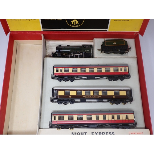 1062 - A boxed Trix Twin Pychley Night Express Set, A/C No.1/373. Contents excellent, box very good conditi... 