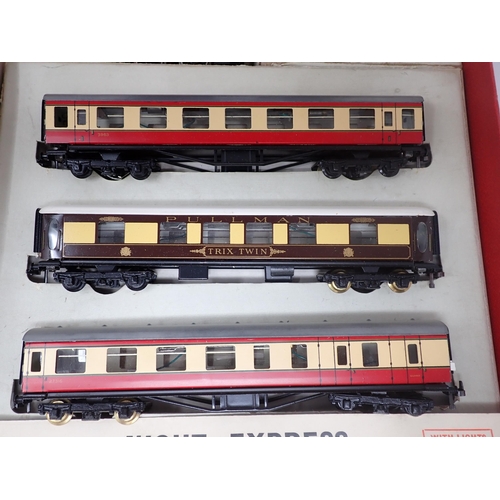 1062 - A boxed Trix Twin Pychley Night Express Set, A/C No.1/373. Contents excellent, box very good conditi... 