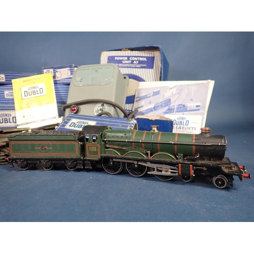 1064 - An unboxed Hornby-Dublo 3-rail 'Bristol Castle' Locomotive, two unboxed Coaches, a boxed T.P.O Coach... 