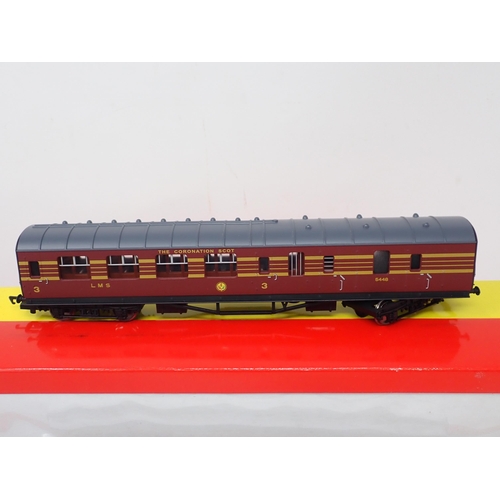 1095 - Two boxed Hornby 00 gauge No.4141 LMS Coronation Composite Coaches, two boxed No.4142 Coronation Bra... 