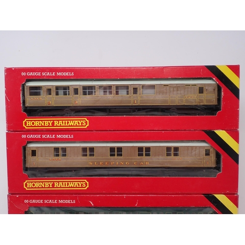 1096 - A boxed Hornby 00 gauge R.431 S.R. Coach, R.432 S.R. Brake Coach, R.436 LNER Brake Coach, R.448 LNER... 