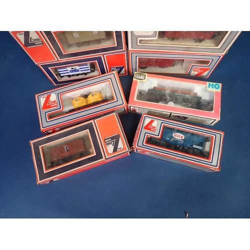 1143 - Twelve boxed Lima and Life-Like Trains 00 gauge Wagons