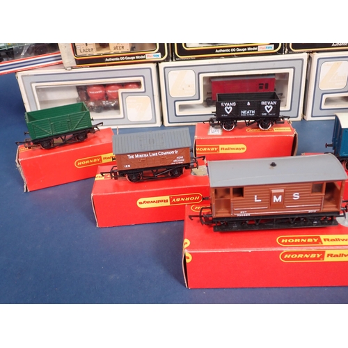 1147 - Twenty boxed Hornby, Lima and Dapol 00 gauge Wagons