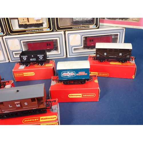 1147 - Twenty boxed Hornby, Lima and Dapol 00 gauge Wagons