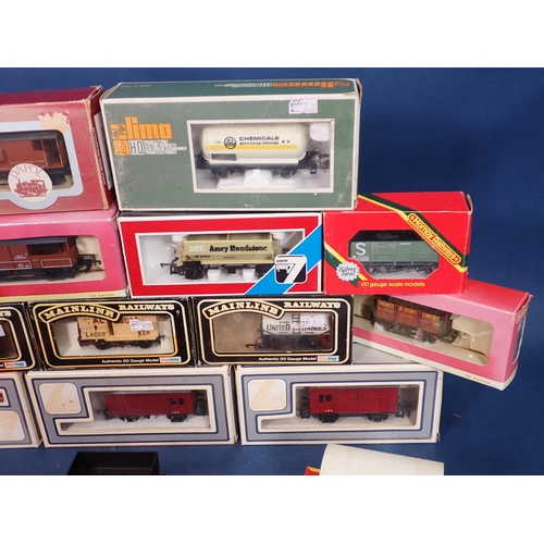 1147 - Twenty boxed Hornby, Lima and Dapol 00 gauge Wagons