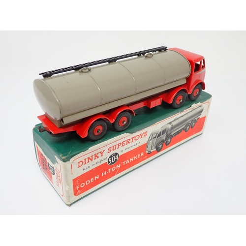 1150 - A boxed Dinky Supertoys No.504 red and fawn Foden 14-Ton Tanker