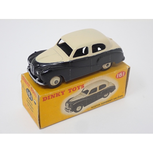 1156 - A boxed Dinky Toys No.161 black and cream Austin Somerset Saloon