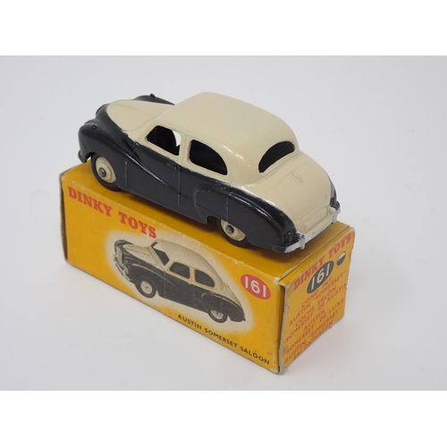 1156 - A boxed Dinky Toys No.161 black and cream Austin Somerset Saloon