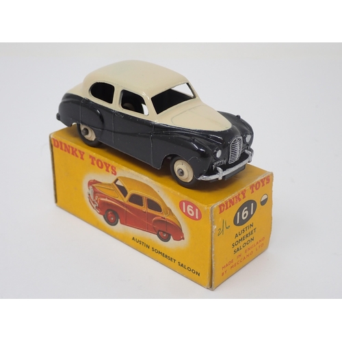 1156 - A boxed Dinky Toys No.161 black and cream Austin Somerset Saloon