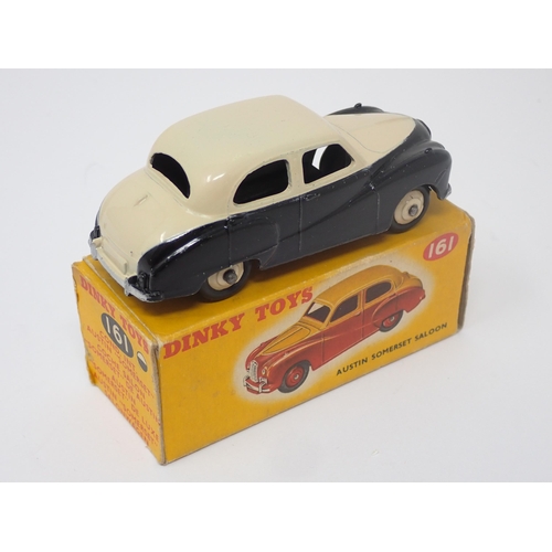 1156 - A boxed Dinky Toys No.161 black and cream Austin Somerset Saloon