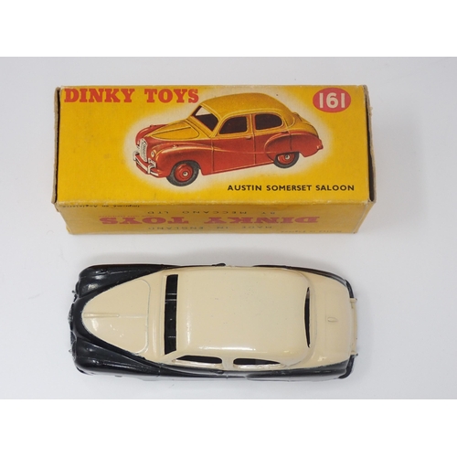 1156 - A boxed Dinky Toys No.161 black and cream Austin Somerset Saloon