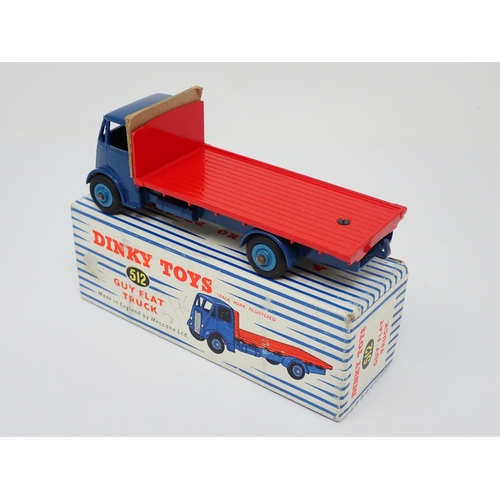 1157 - A boxed Dinky Toys No.512 blue and red Guy Flat Truck