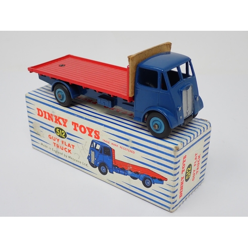 1157 - A boxed Dinky Toys No.512 blue and red Guy Flat Truck